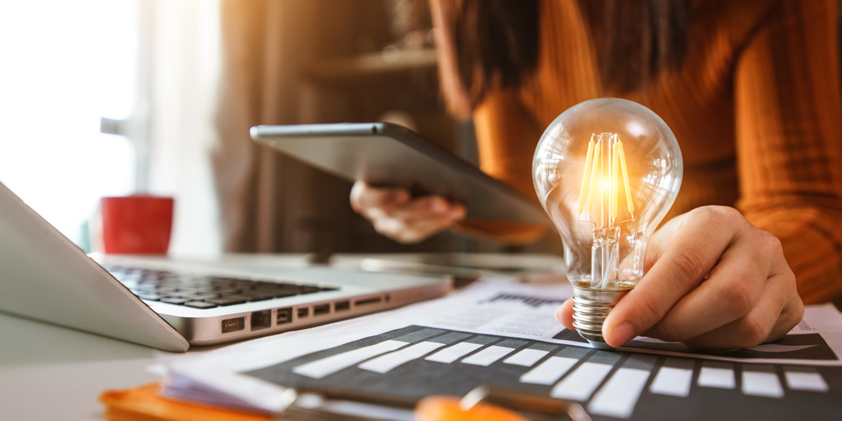 Light Bulb Lighting Up On A Desk With No Electric