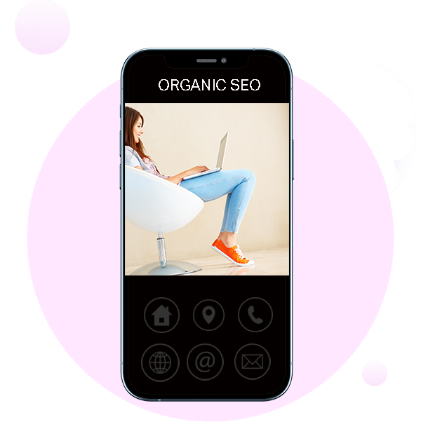 girl sitting with her laptop framed by an iphone Organic SEO